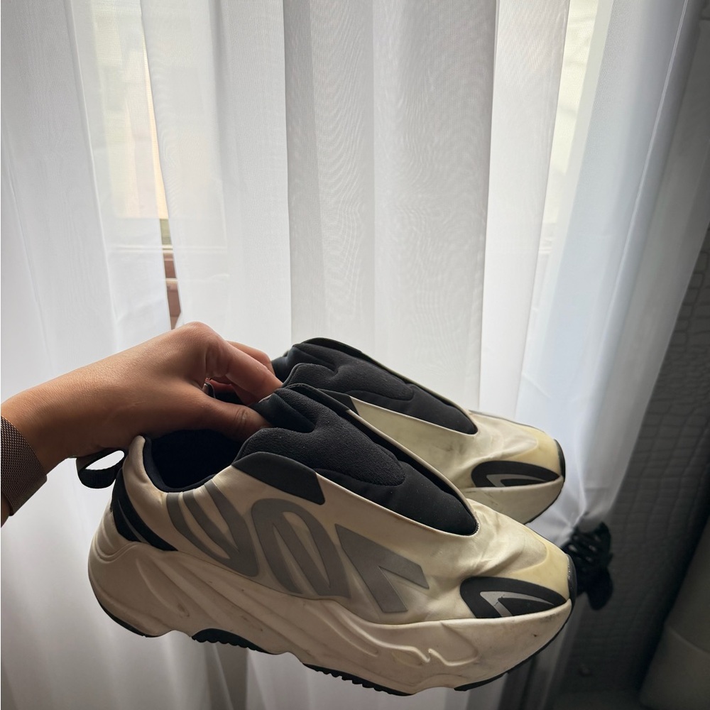 Yeezy Black and Cream Athletic Shoes